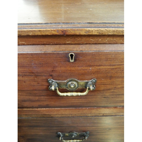 26 - A late Victorian mahogany dressing chest with bevelled glass dressing mirror over two short over two... 