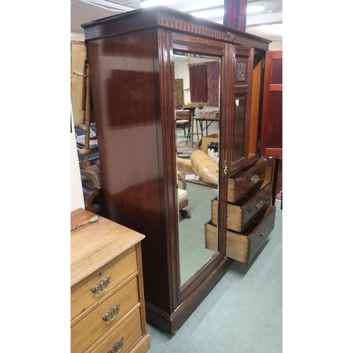 38 - A Victorian mahogany mirror door compactum wardrobe with single mirror door to the left of pair of c... 