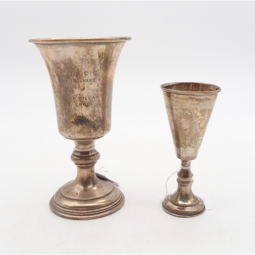 401 - A silver goblet, on a footed circular base, with a knopped capstan stem, with presentational inscrip... 