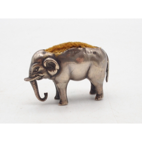 403 - A novelty silver pin cushion, modelled as an elephant, Birmingham, marks rubbed, 9gms