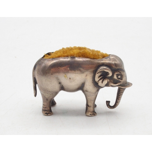 403 - A novelty silver pin cushion, modelled as an elephant, Birmingham, marks rubbed, 9gms