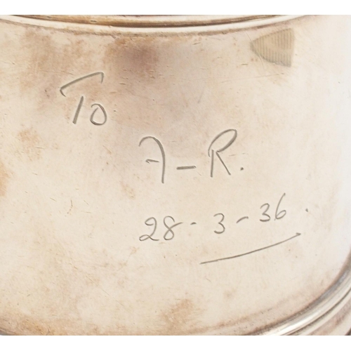 418 - A George VI  Britannia silver tankard, with banded decoration and an inscription to the body, by Gol... 