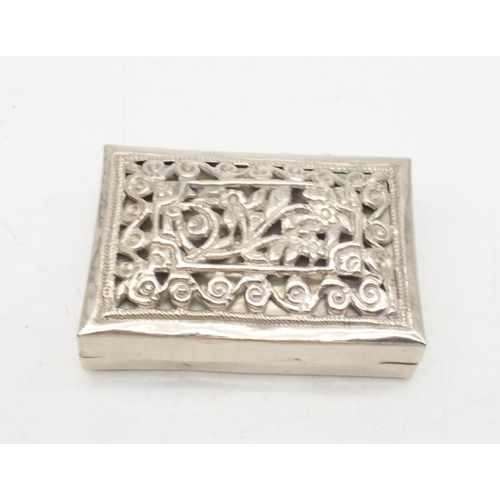 438 - A Chinese silver snuff box, the lid with pierced floral openwork, the base embossed with vine motifs... 