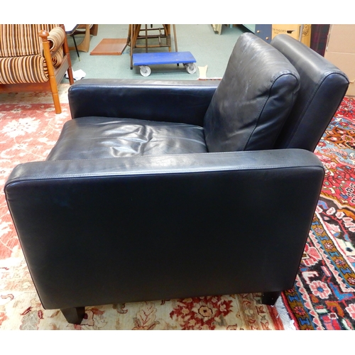 65 - A contemporary black leather upholstered Habitat open armchair on black square tapering feet, 77cm h... 