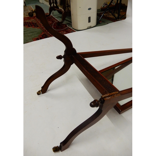 68 - A mid 20th century stained teak framed armchair and a 20th century mahogany cheval mirror (def) (2)