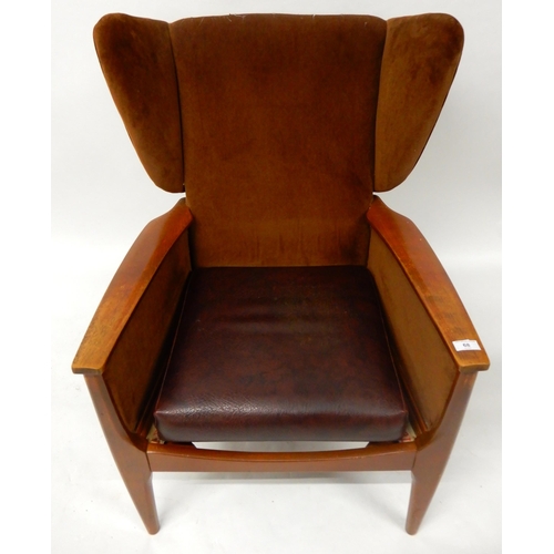 68 - A mid 20th century stained teak framed armchair and a 20th century mahogany cheval mirror (def) (2)