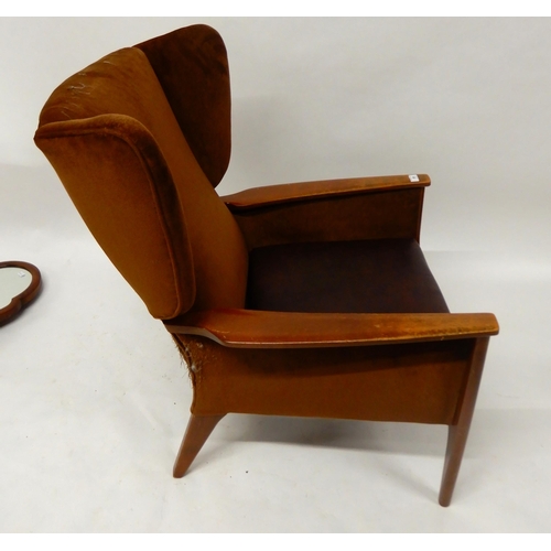 68 - A mid 20th century stained teak framed armchair and a 20th century mahogany cheval mirror (def) (2)