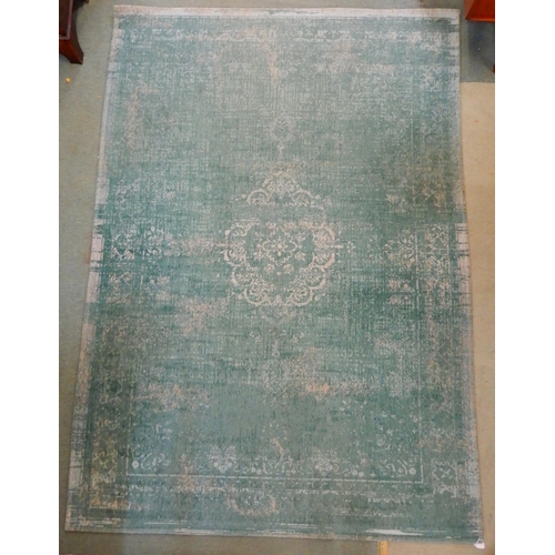 69 - A modern aqua ground Belgian Louis de Poortere rug with distressed Kashan design, 240cm long x 170cm... 