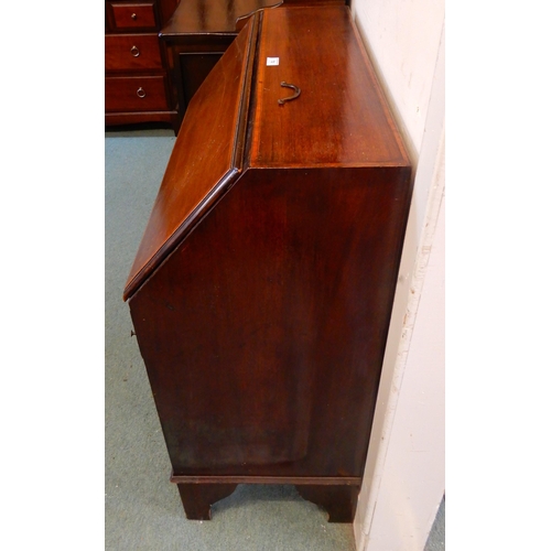 70 - An early 20th century mahogany bureau with fall front writing compartment over three drawers, 96cm h... 