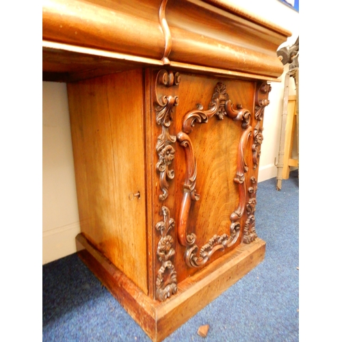 84 - A Victorian mahogany pedestal sideboard with carved scrolled back splash over long drawer flanked by... 