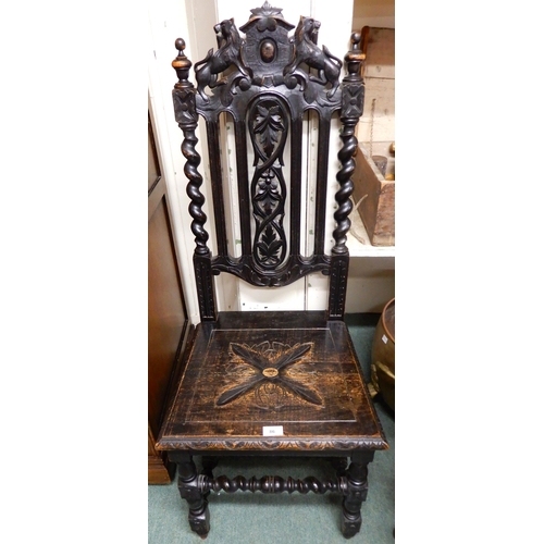 86 - A Victorian ebonised oak barley twist hall chair with carved splat and seat on stretchered barley tw... 