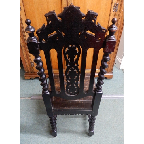 86 - A Victorian ebonised oak barley twist hall chair with carved splat and seat on stretchered barley tw... 