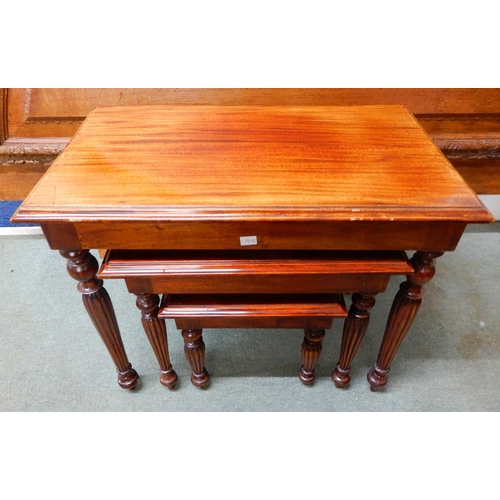 87 - A 20th century oak demi lune head board, 113cm high x 180cm wide and a mahogany nest of three tables... 