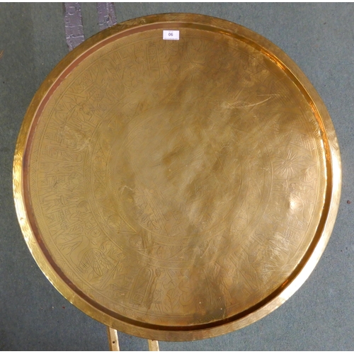 90 - A 20th century circular brass topped Moorish folding table with bone inlaid folding base, 58cm high ... 