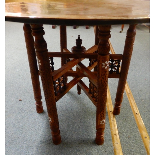 90 - A 20th century circular brass topped Moorish folding table with bone inlaid folding base, 58cm high ... 