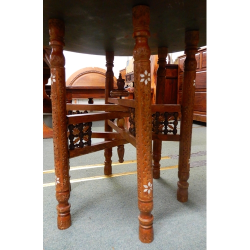 90 - A 20th century circular brass topped Moorish folding table with bone inlaid folding base, 58cm high ... 