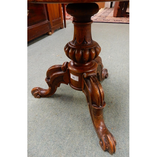 91 - A Victorian walnut adjustable piano stool with fruit and foliate upholstered seat on baluster tripod... 