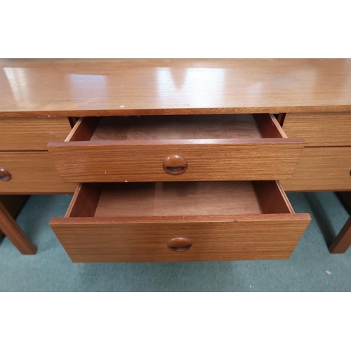 99 - A mid 20th century teak Schreiber six drawer dressing table, 113cm high x 149cm wide x 44cm deep