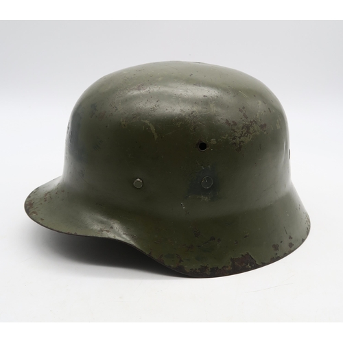 521 - A WW2 German-style steel helmet, or Stahlhelm