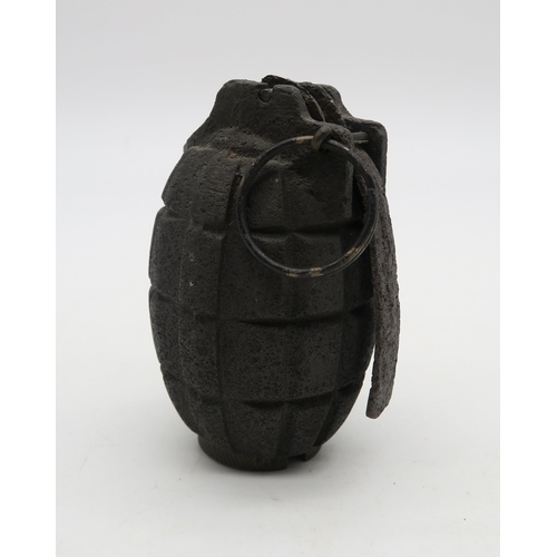 525 - A WW1 Mills bomb/hand grenade, the base stamped 