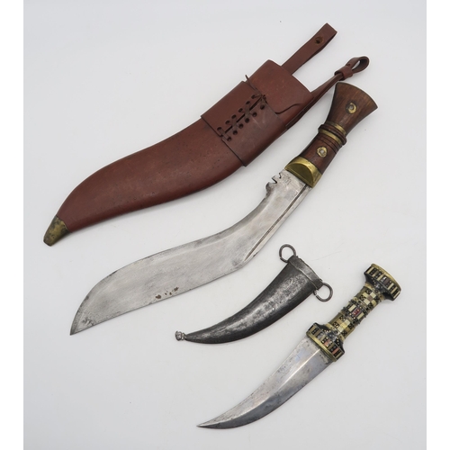 534 - A large kukri (blade measuring approx. 35cm in length) and a Middle Eastern jambiya dagger with bone... 