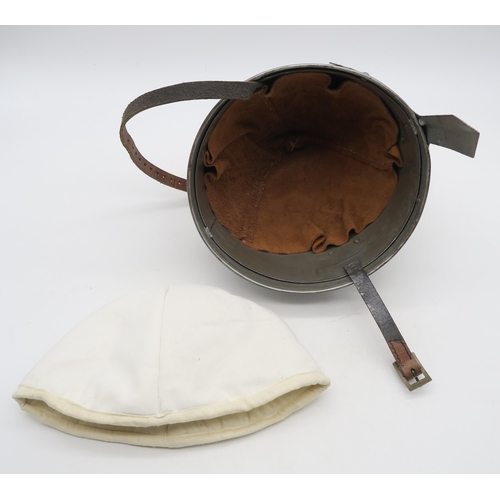 536 - A reproduction Norman nasal helmet, with leather liner and additional padded cloth cap