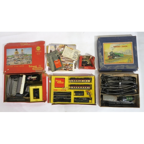 610 - Three boxed train sets: a Hornby Clockwork 0-Gauge No. 101 Tank Passenger Set, a Tri-ang 00-Gauge El... 