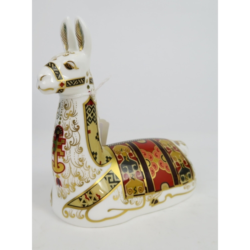 719C - A Royal Crown Derby Imari palette Porcelain paperweight of a Llama designed modelled and decorated b... 