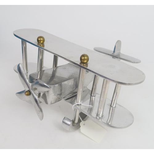 779A - An Aluminium Art Deco Style sea bi plane with movable propellers, wingspan 28cm