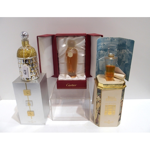 279 - A bottle of Guerlain 'Metallica' perfume in box together with a bottle of Cartier 'So Pretty' perfum... 