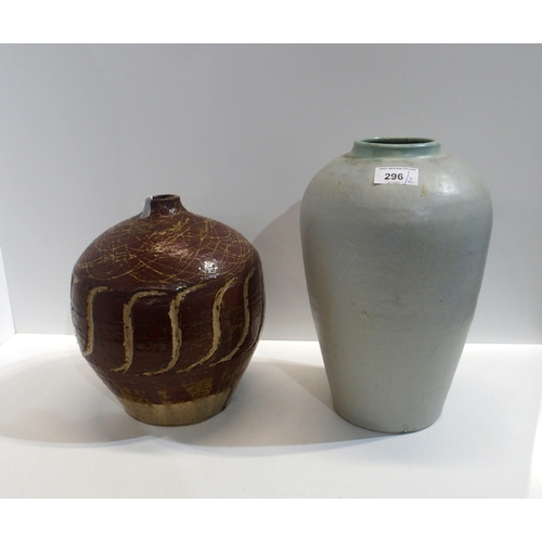 296 - An Upchurch glazed pottery vase and a studio pottery vase signed Harner