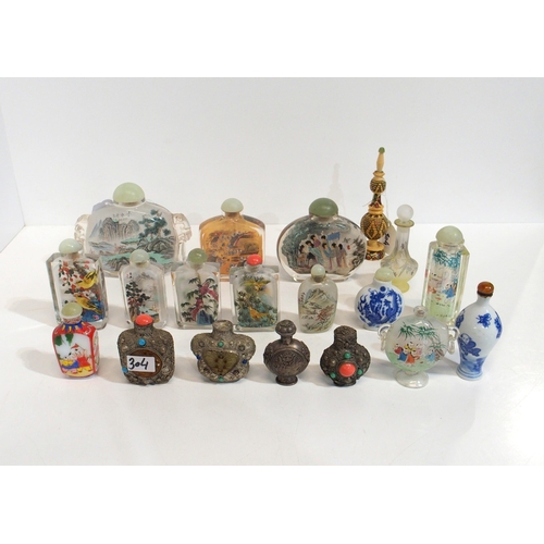 304 - A collection of internally painted snuff bottles and other examples