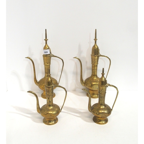 309 - Four Turkish brass coffee pots