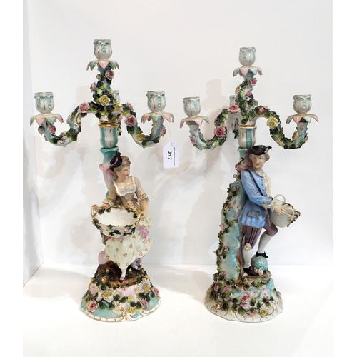 317 - A pair of continental figural candelabra 53cm high