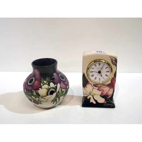 338 - A Moorcroft Anemone trial vase, dated 1.5.17 together with a trial clock decorated with pink flowers... 