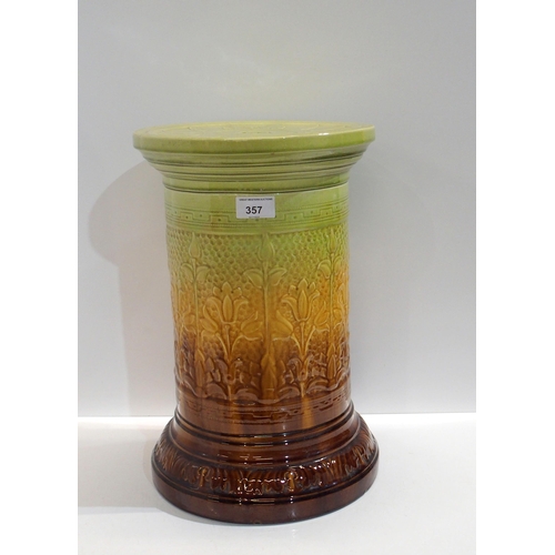 357 - A Leeds Art Pottery pedestal, glazed in brown, yellow and green