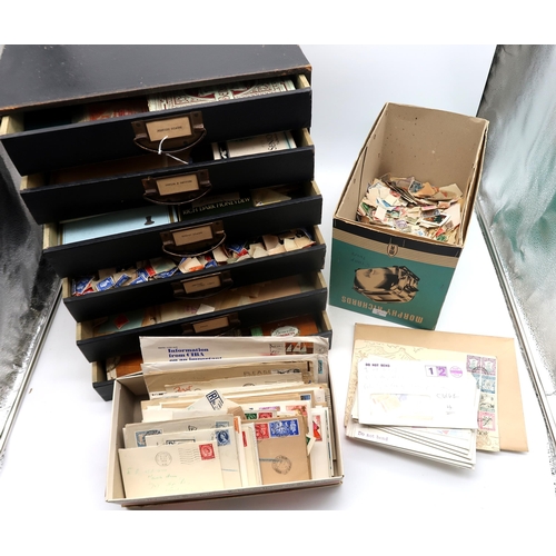 654 - A collector's cabinet of worldwide stamps