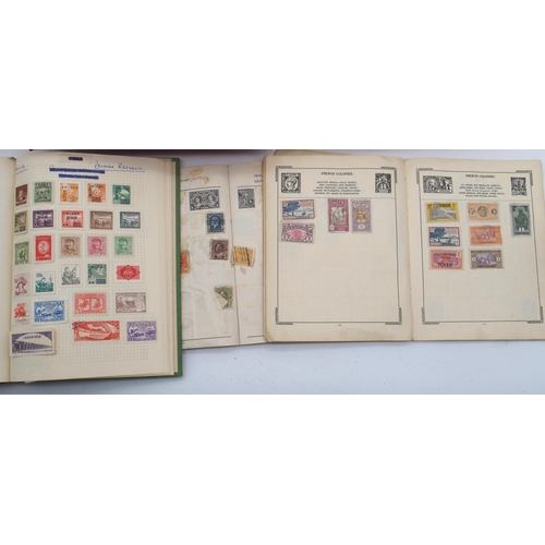 679 - A collection of British and international stamps, including five various hallmarked silver ingot 