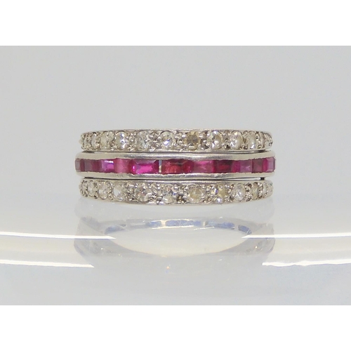 690 - A night & day ring set with sapphires, rubies and diamonds, set in white metal. (af) size N, wei... 