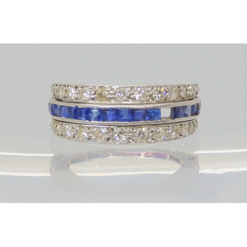 690 - A night & day ring set with sapphires, rubies and diamonds, set in white metal. (af) size N, wei... 