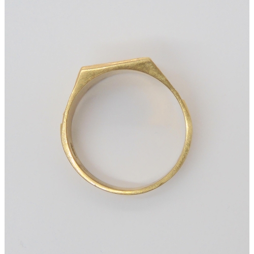 694 - A retro diamond cut signet ring, hallmarked London 1977, size W1/2, weight 7.4gms
