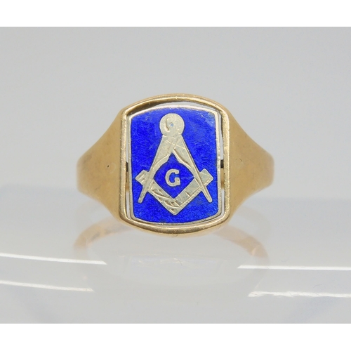 703 - A 9ct gold enamelled Masonic swivel signet ring, size R, weight 7.5gms