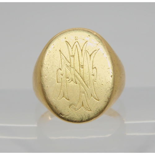 707 - An 18ct gold signet ring , hallmarked Chester 1910, size R, weight 14.2gms 