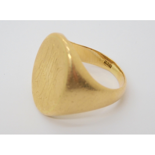 707 - An 18ct gold signet ring , hallmarked Chester 1910, size R, weight 14.2gms 