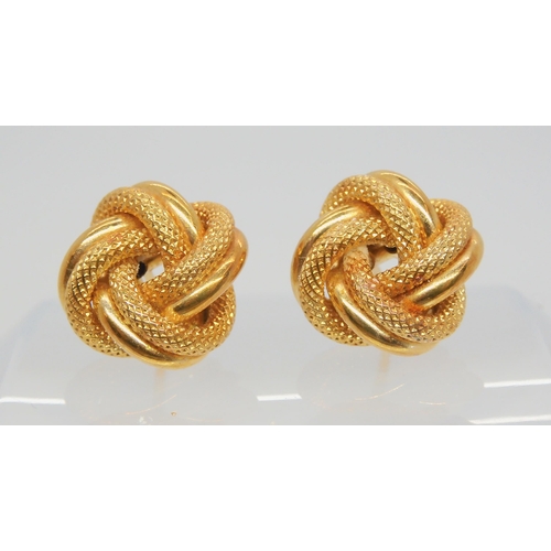 712 - A pair of 18ct gold knot earrings, weight 5.3gms