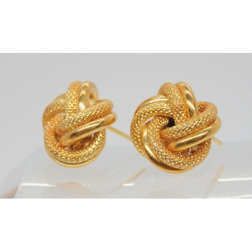 712 - A pair of 18ct gold knot earrings, weight 5.3gms