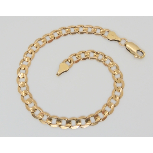 713 - A 9ct gold curb link bracelet, length 22.2cm, weight 7.9gms