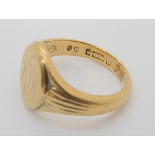 717 - A 9ct gold signet ring with reeded shoulders, size R, a Masonic example size I, and another (af), we... 