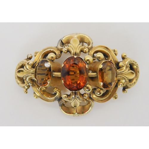 729 - A Victorian citrine brooch, dimensions 5.8cm x 4cm, weight 18.1gms