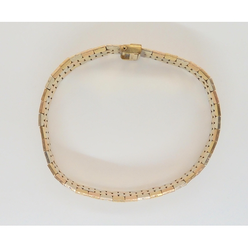 731 - A 9ct three colour gold bracelet, length 18cm, weight 29.1gms